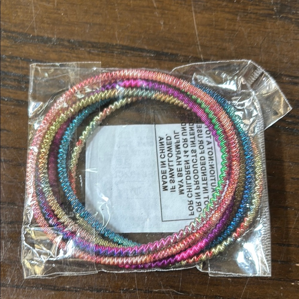 Assorted bracelets steel 7in twist coil 3mm package includes 5 of them.